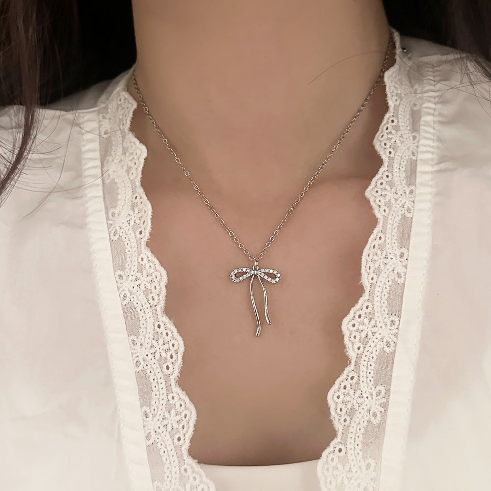 Starlight Bow Necklace Winsleyco