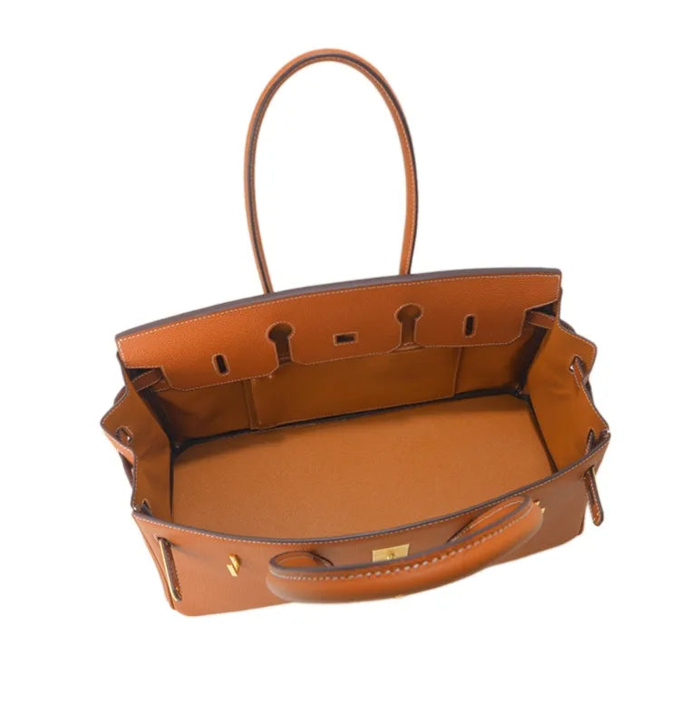 Adela Elegant Shoulder bag in luxurious Togo leather with gold hardware 4