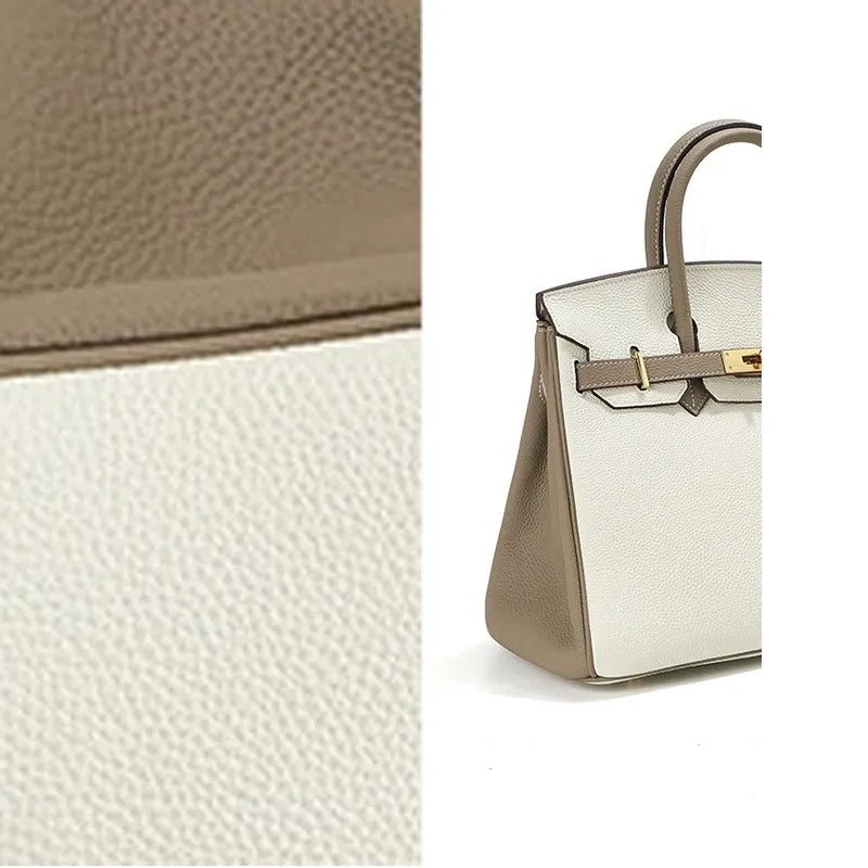Stylish two-tone handbag made of genuine Togo leather. 20