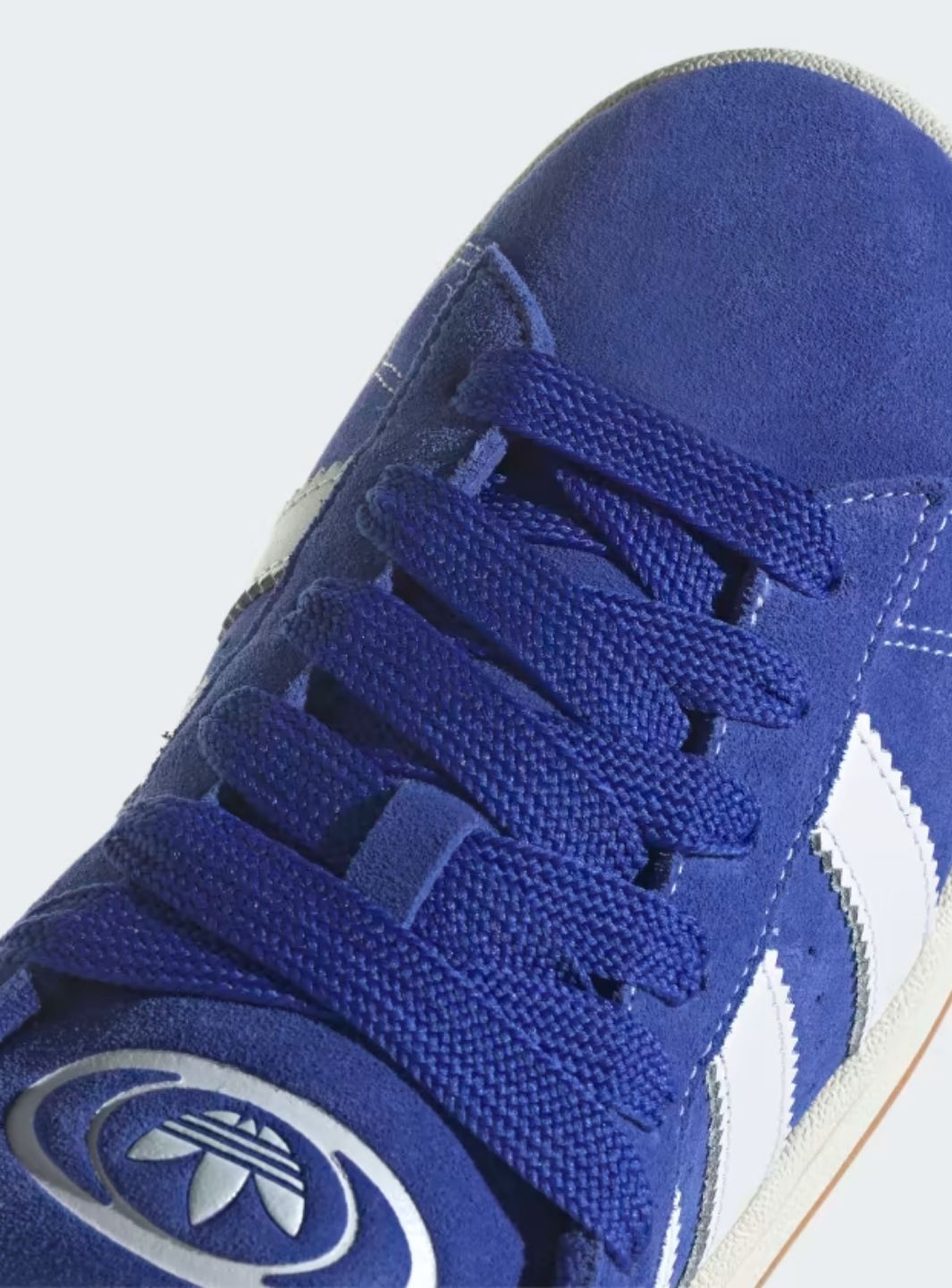Adidas Campus 00s Semi Lucid Blue Elegant sneakers showcasing blue suede and Cloud White accents. 10
