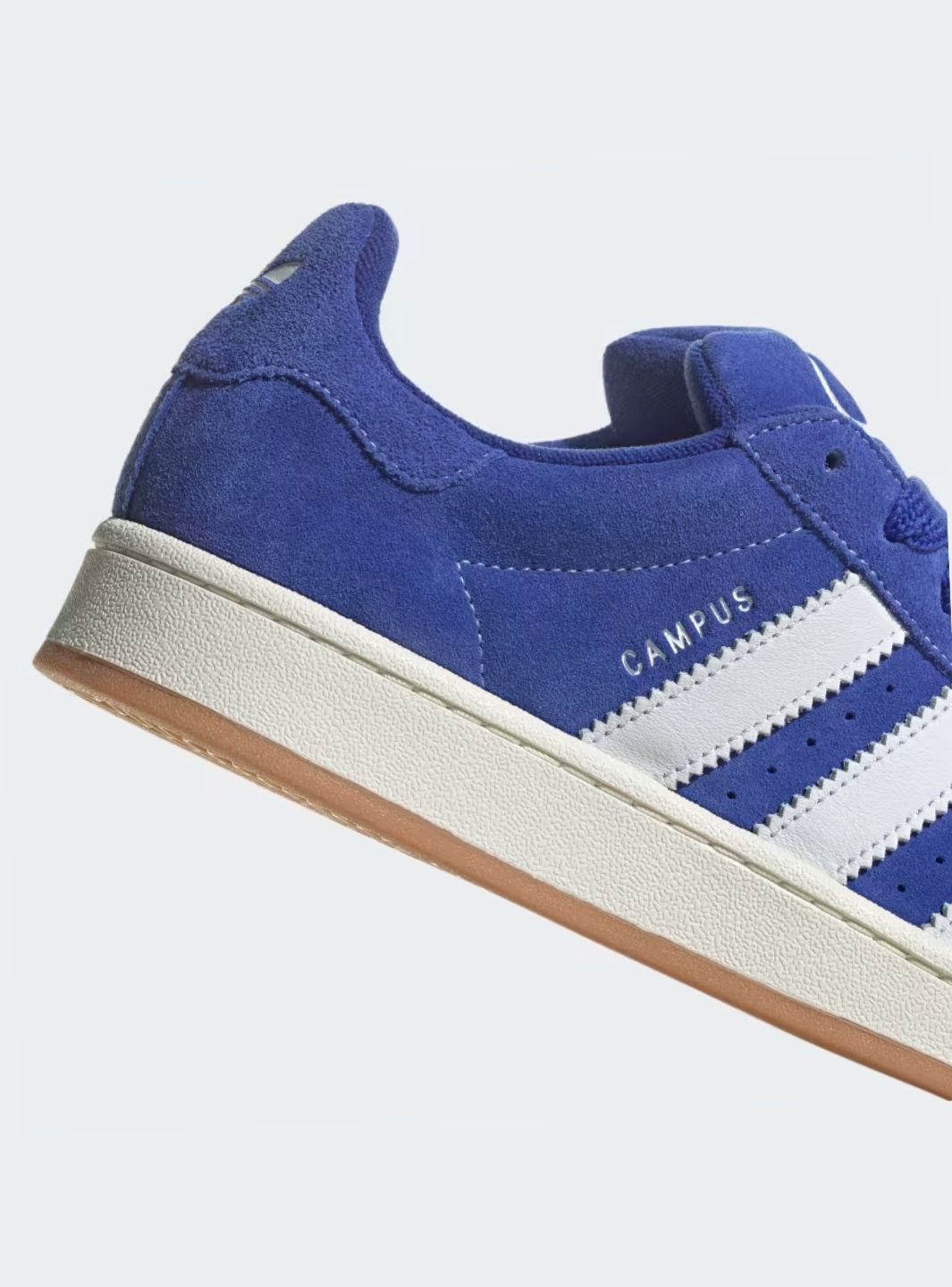 Adidas Campus 00s Semi Lucid Blue Elegant sneakers showcasing blue suede and Cloud White accents. 11