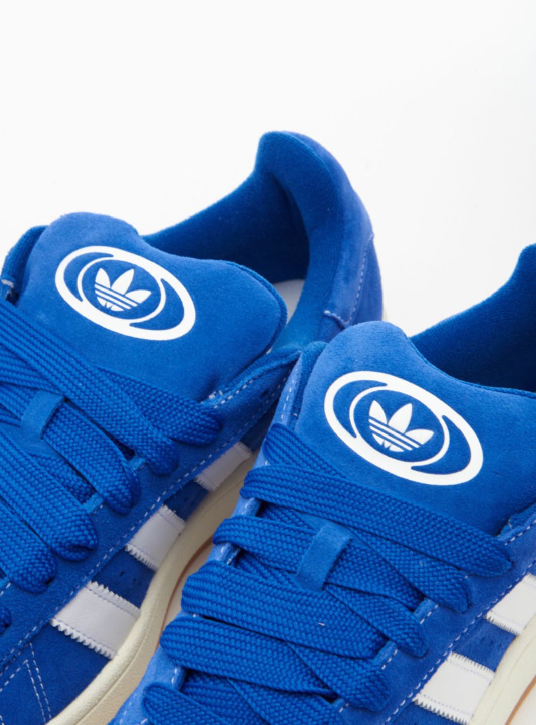 Adidas Campus 00s Semi Lucid Blue Elegant sneakers showcasing blue suede and Cloud White accents. 5