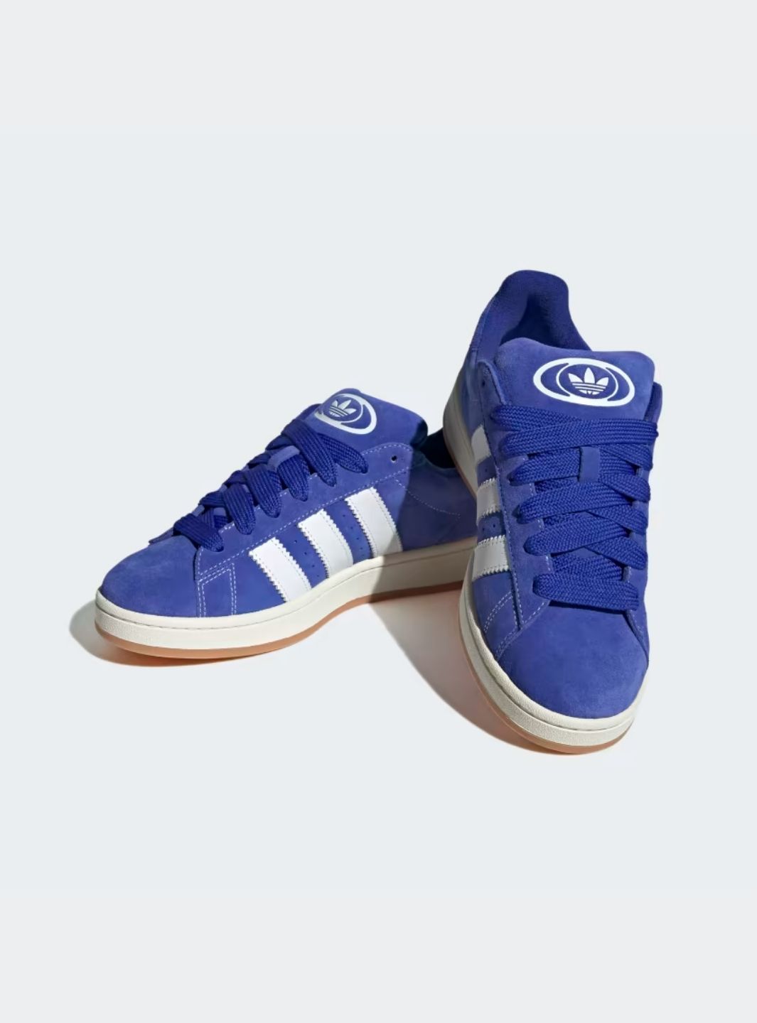 Adidas Campus 00s Semi Lucid Blue Elegant sneakers showcasing blue suede and Cloud White accents. 7