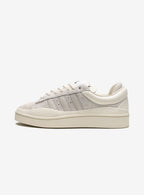 Adidas Campus Light Bad Bunny sneakers in elegant cream color.