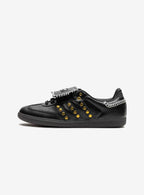 Adidas Samba Wales Bonner Studded Pack in elegant black leather with golden accents.