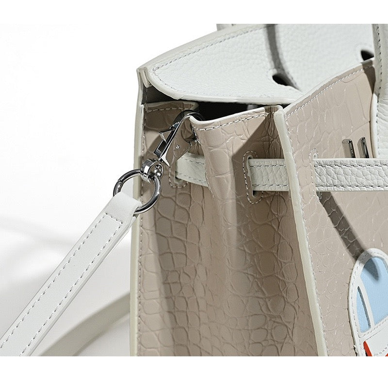 Caldwell Elegant Bag made from genuine leather with a structured design. 21