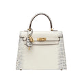 Luxurious exotic animal skin handbag with round handle