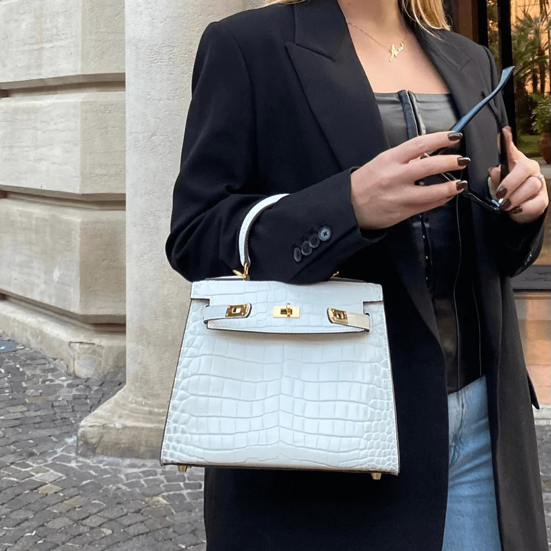 Luxurious exotic animal skin handbag with round handle 3