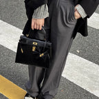 Luxurious exotic animal skin handbag with round handle 5