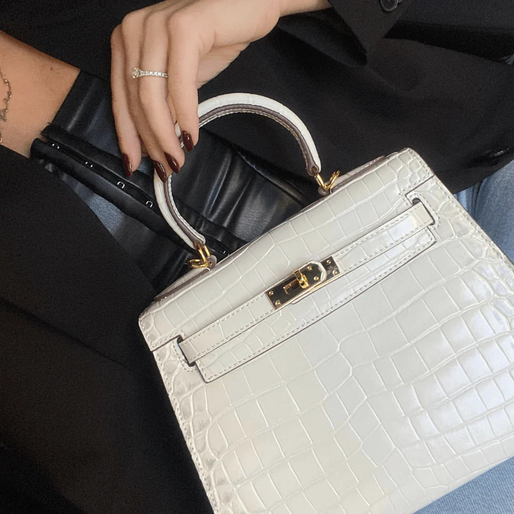 Luxurious exotic animal skin handbag with round handle 7