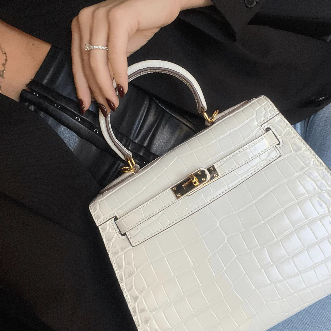 Luxurious exotic animal skin handbag with round handle 7