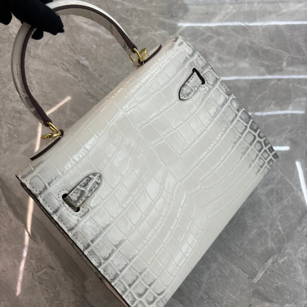 Luxurious exotic animal skin handbag with round handle 8