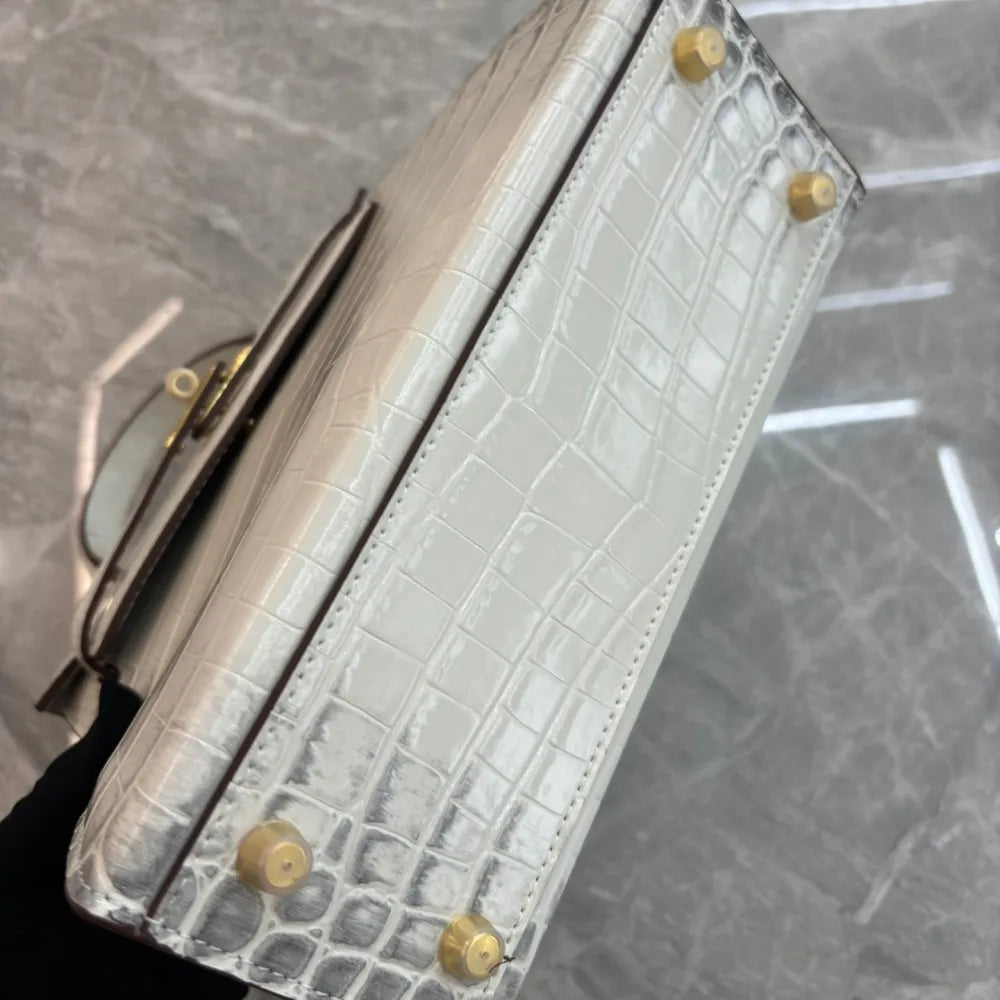 Luxurious exotic animal skin handbag with round handle 9