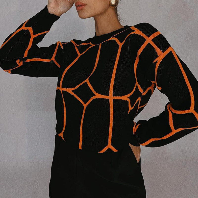 Elegant ladies long sleeve sweater with geometric design. 2