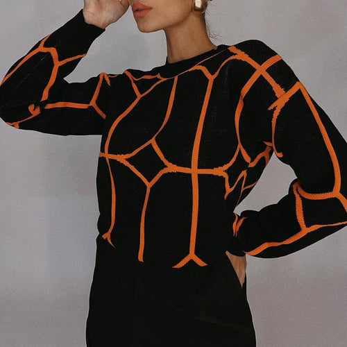 Elegant ladies long sleeve sweater with geometric design. 2