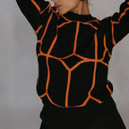 Elegant ladies long sleeve sweater with geometric design. 5