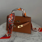 Chic Epsom leather handbag in various colors. 16
