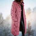 Elegant ladies cardigan made from soft material with a coarse cable pattern.