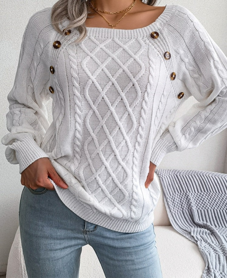 Stylish ladies diamond knit sweater with round neck for autumn and winter.