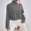 Stylish high collar sweater for ladies in soft wool blend.