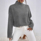 Stylish high collar sweater for ladies in soft wool blend.