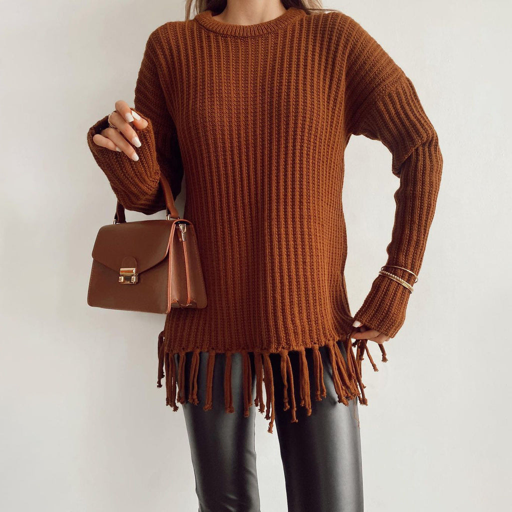 Ladies knitted sweater with fringe, perfect for stylish comfort.