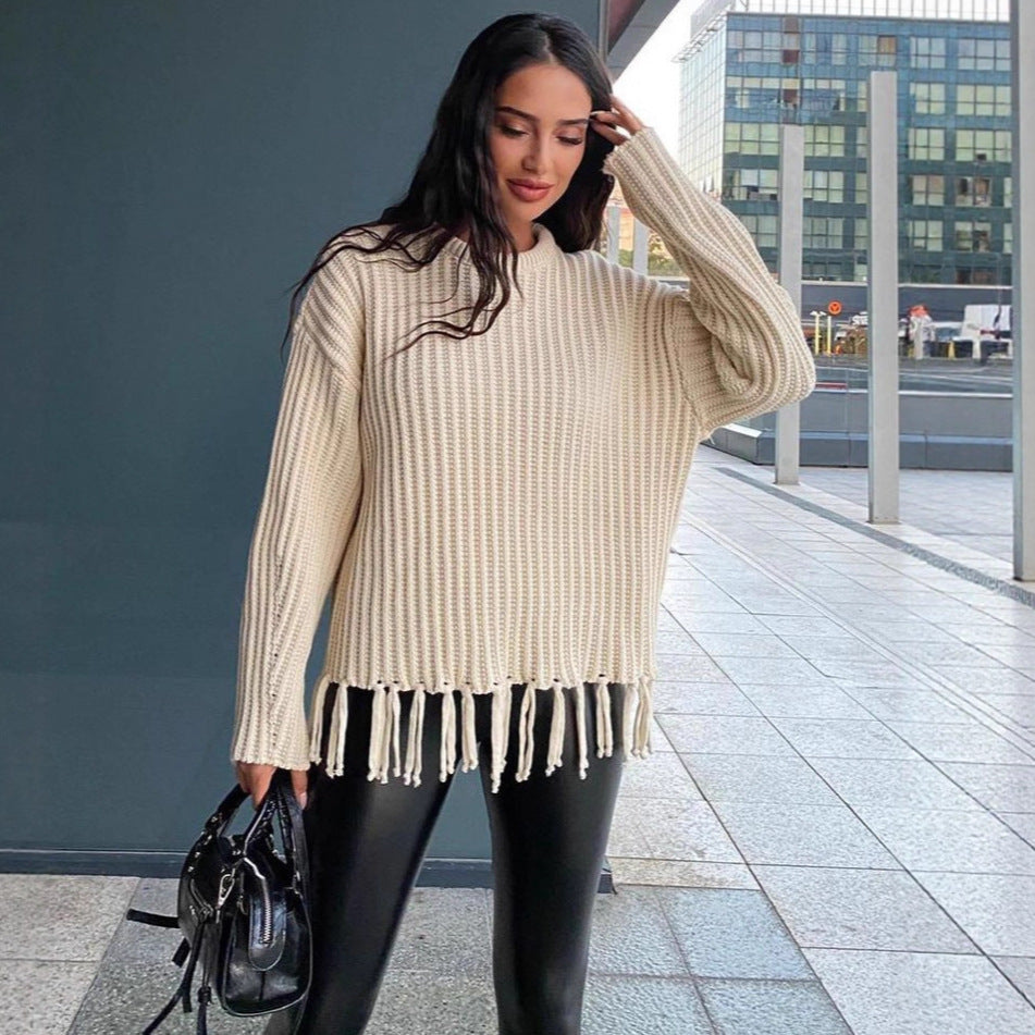 Ladies knitted sweater with fringe, perfect for stylish comfort. 2