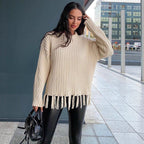 Ladies knitted sweater with fringe, perfect for stylish comfort. 2