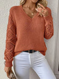 Elegant long sleeve V-neck sweater for women in various colors.