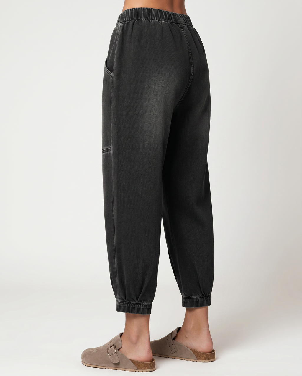 Patsy tapered jeans in black with elastic waistband for women. 3