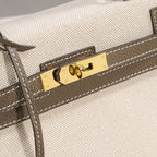 Sola Elegant Handbag with two-tone design and gold-tone hardware. 10