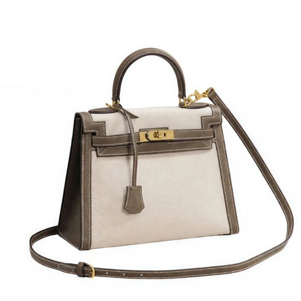 Sola Elegant Handbag with two-tone design and gold-tone hardware. 14