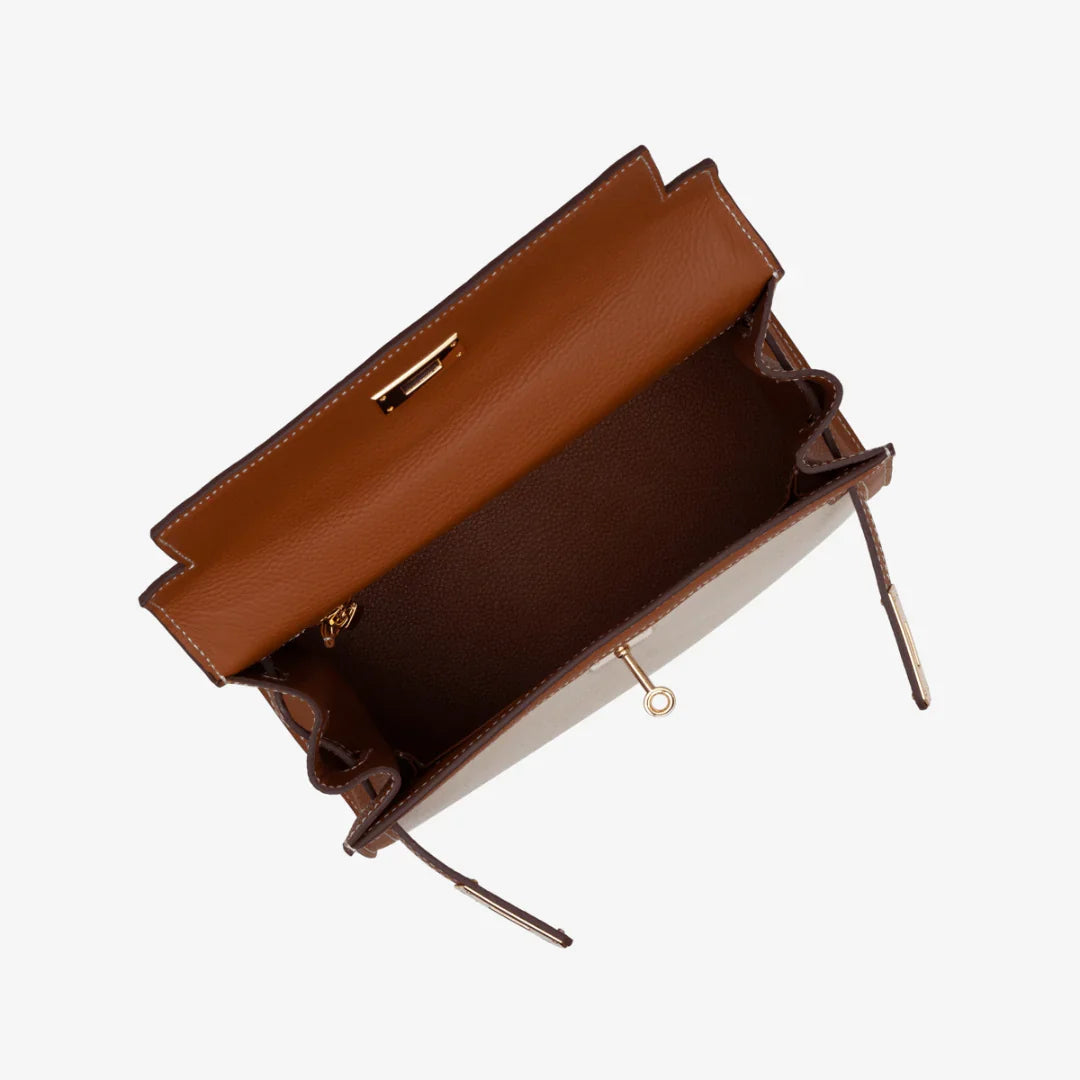 Sola Elegant Handbag with two-tone design and gold-tone hardware. 15