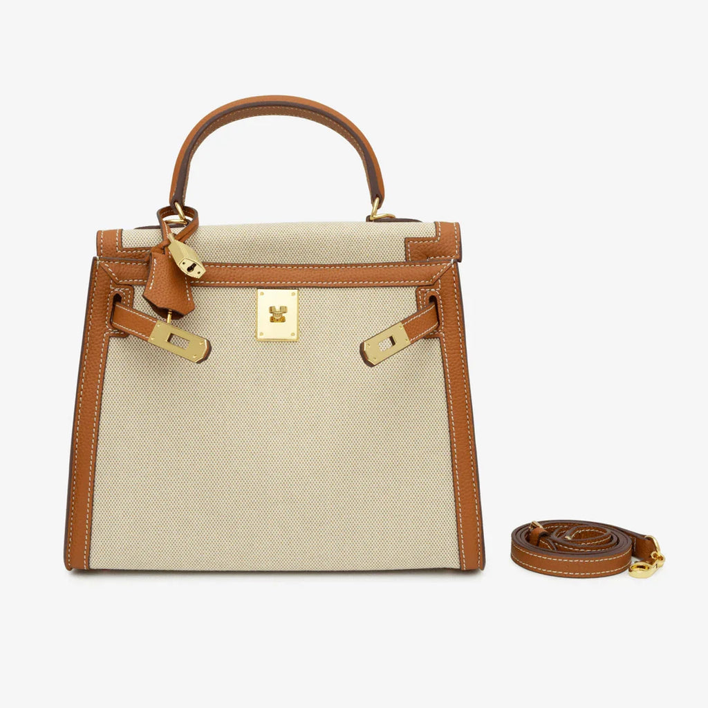 Sola Elegant Handbag with two-tone design and gold-tone hardware. 17