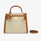 Sola Elegant Handbag with two-tone design and gold-tone hardware. 17