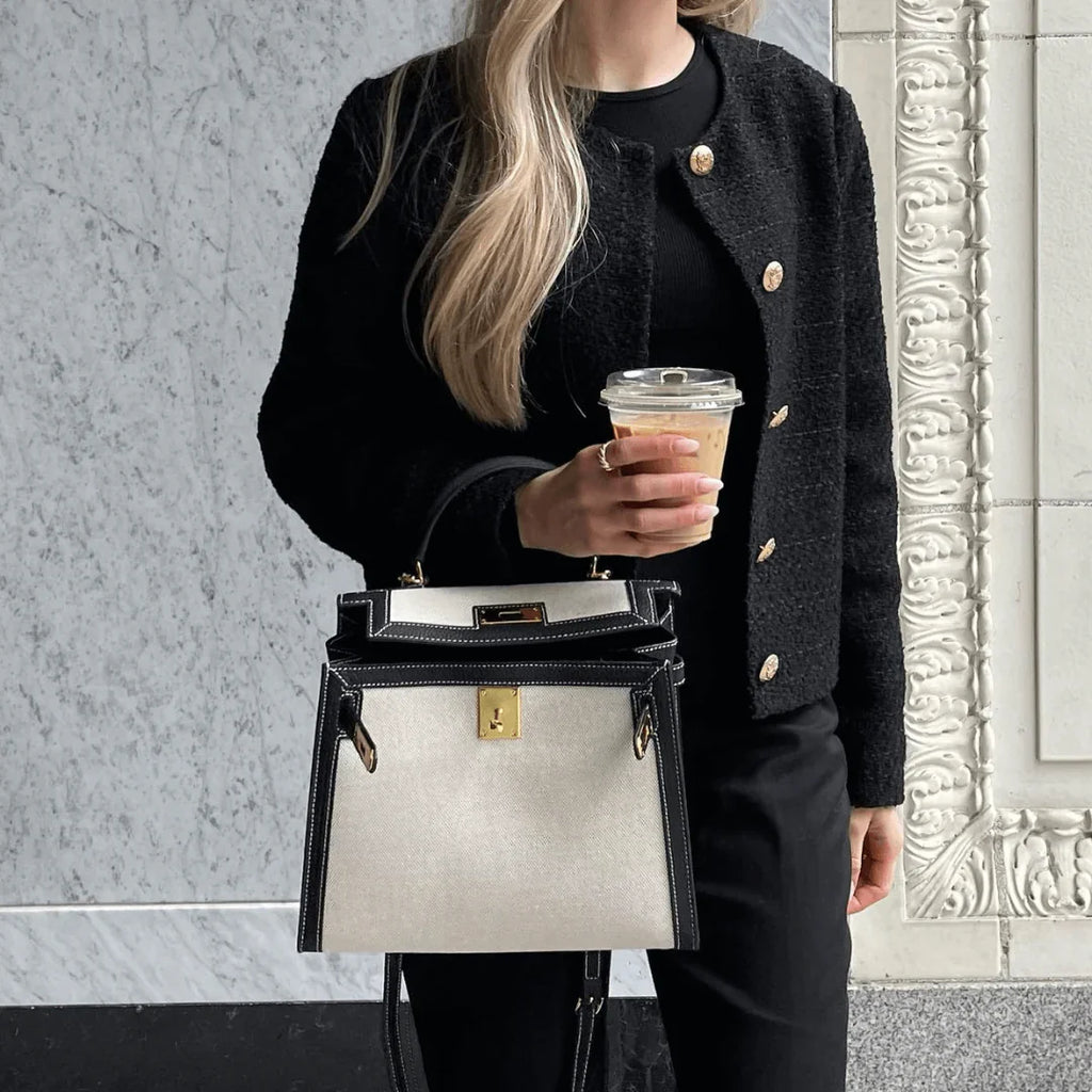 Sola Elegant Handbag with two-tone design and gold-tone hardware. 5