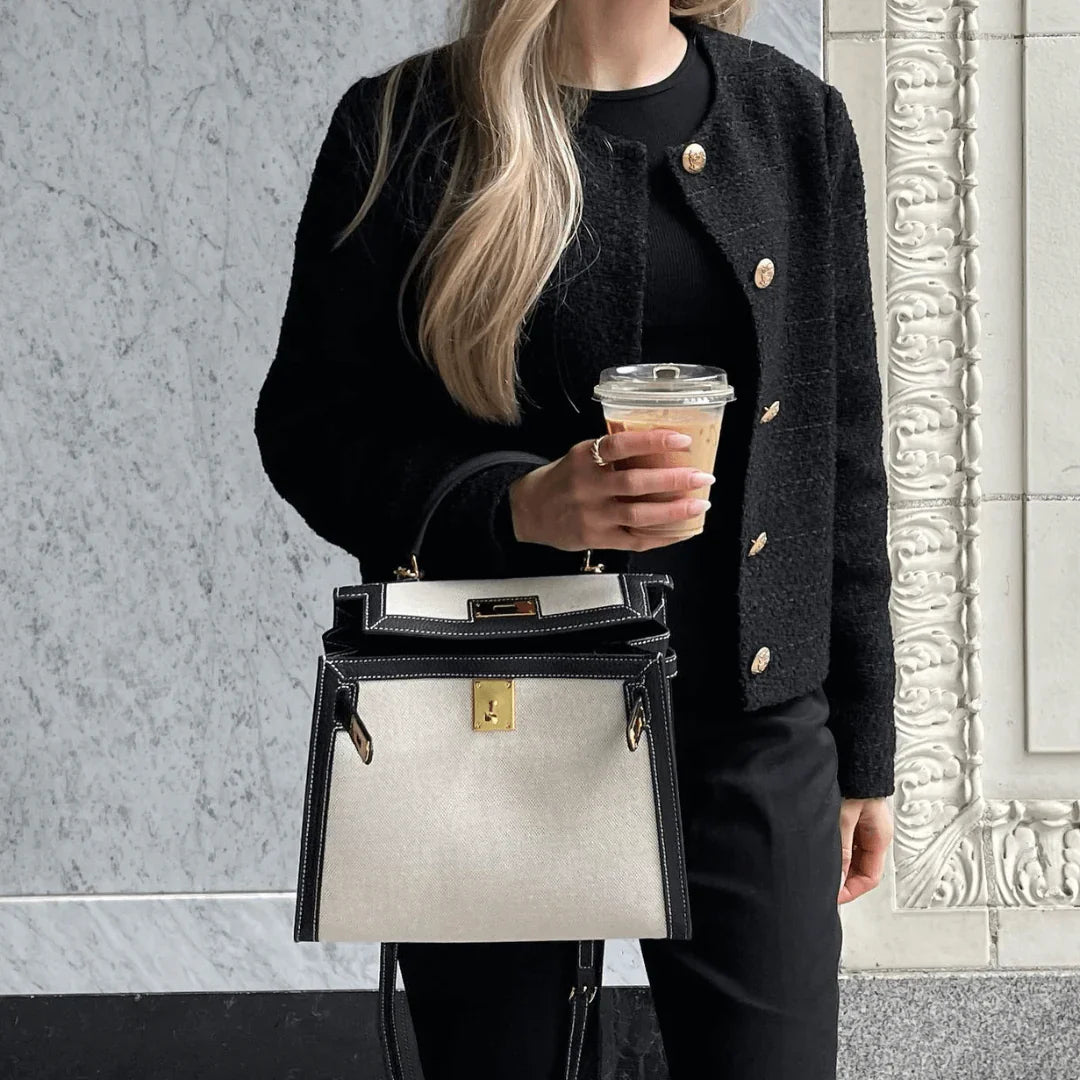 Sola Elegant Handbag with two-tone design and gold-tone hardware. 5