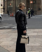Sola Elegant Handbag with two-tone design and gold-tone hardware. 8