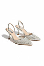 Sparkling heavenly slingback heels in gold for elegant occasions. 4