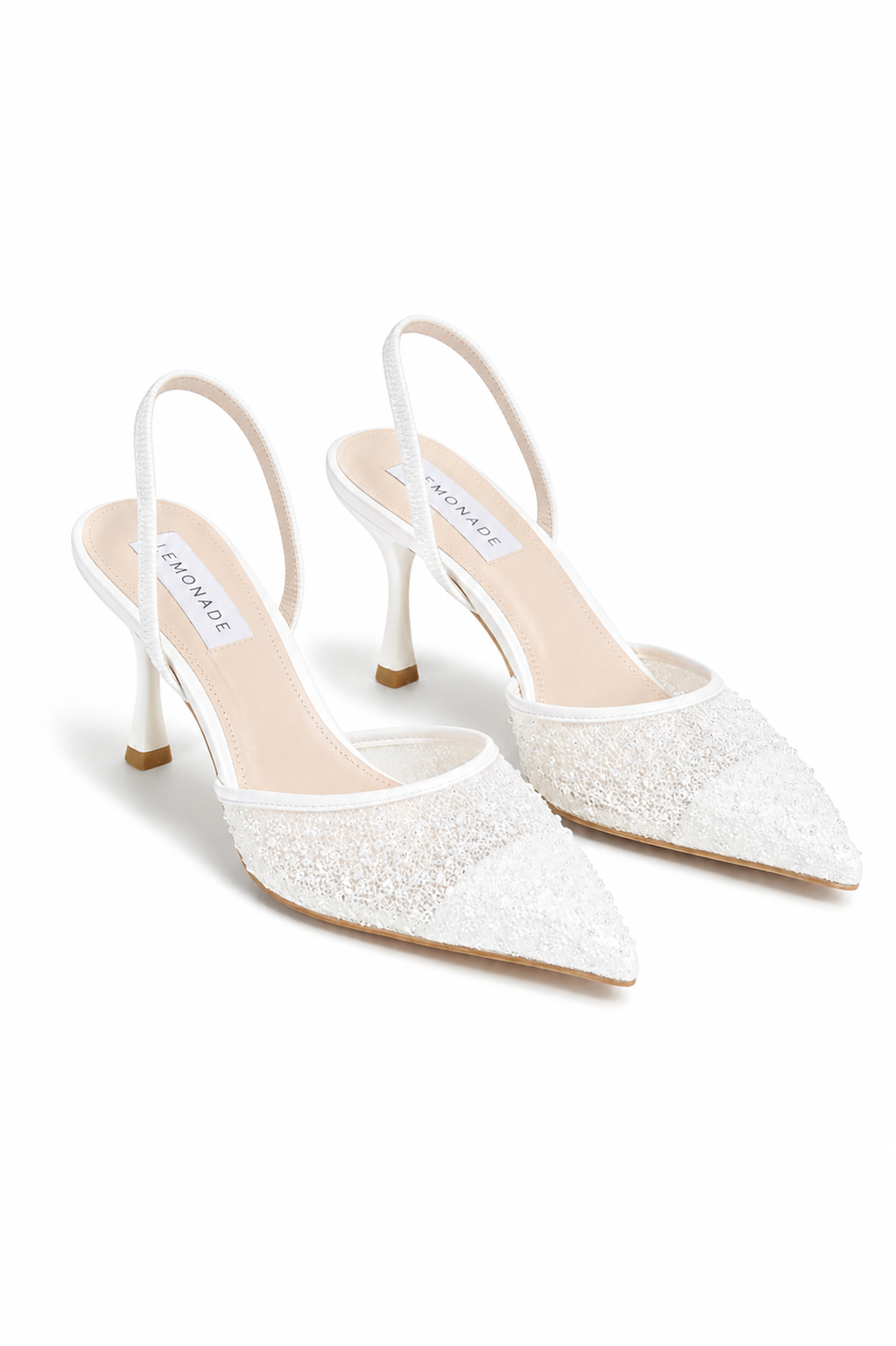 Sparkling heavenly slingback heels in white with glitter embellishments. 4