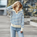 Elegant striped women's sweater with V-neck, perfect for casual and office wear.