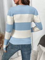 Elegant striped women's sweater with round neckline and long sleeves. 5