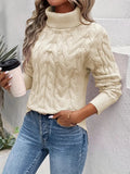 Stylish turtleneck sweater with cable knit detail for women.