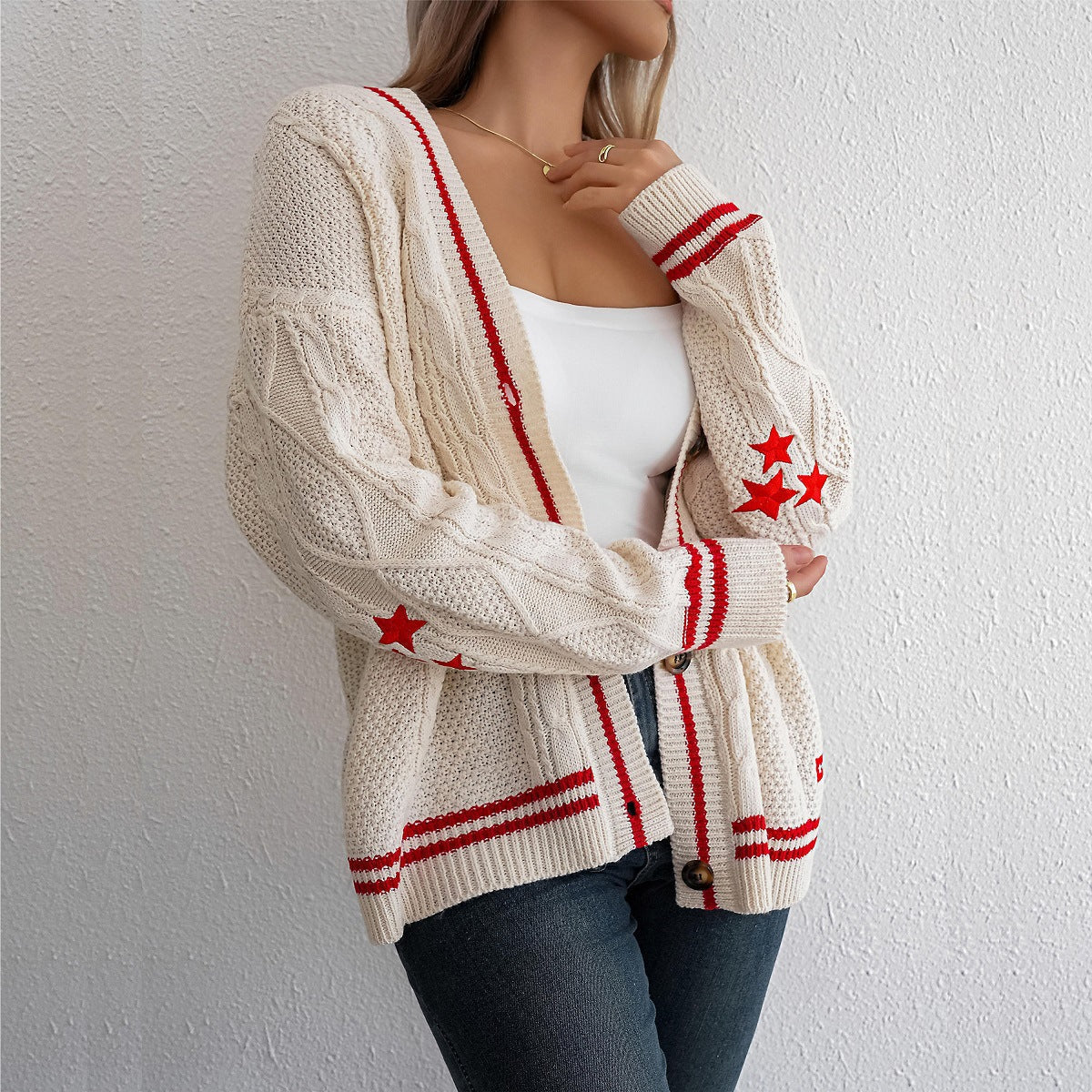 Stylish women's cardigan with cable pattern and contrast stripes. 2