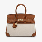 Tyra Elegant Handbag with two-tone design and gold-tone hardware