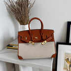 Tyra Elegant Handbag with two-tone design and gold-tone hardware 11