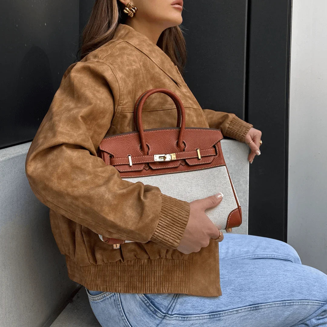 Tyra Elegant Handbag with two-tone design and gold-tone hardware 9