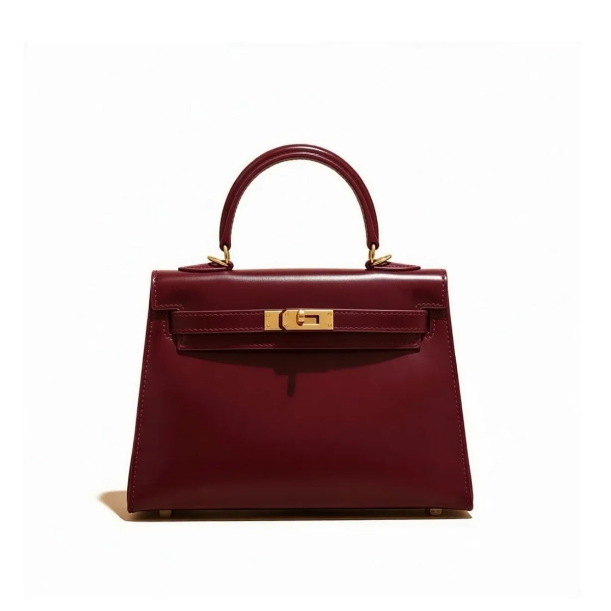 Vanessa Elegant mini handbag in burgundy and black leather.
