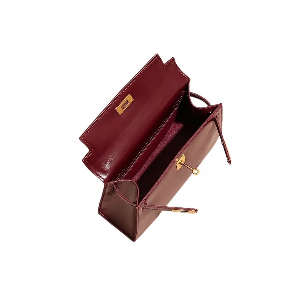 Vanessa Elegant mini handbag in burgundy and black leather. 15