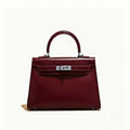 Elegant mini handbag made of genuine leather in burgundy and black. 2